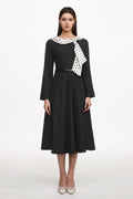Tikia Vintage Contour Long Sleeve Knit Maxi Dress	